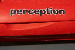 a red car with black text